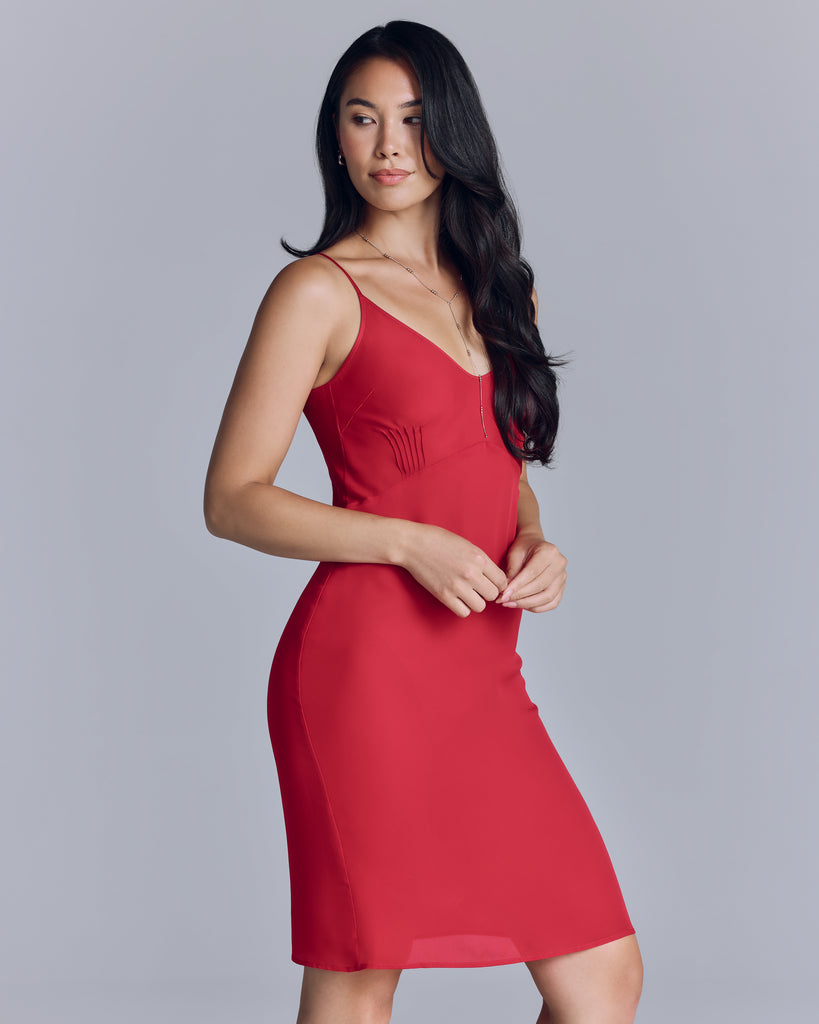 The Cadel Scarlet slip from Araks is easy and comfortable, with a vee neckline, draped fit through the body, and pin tucking details under the bust