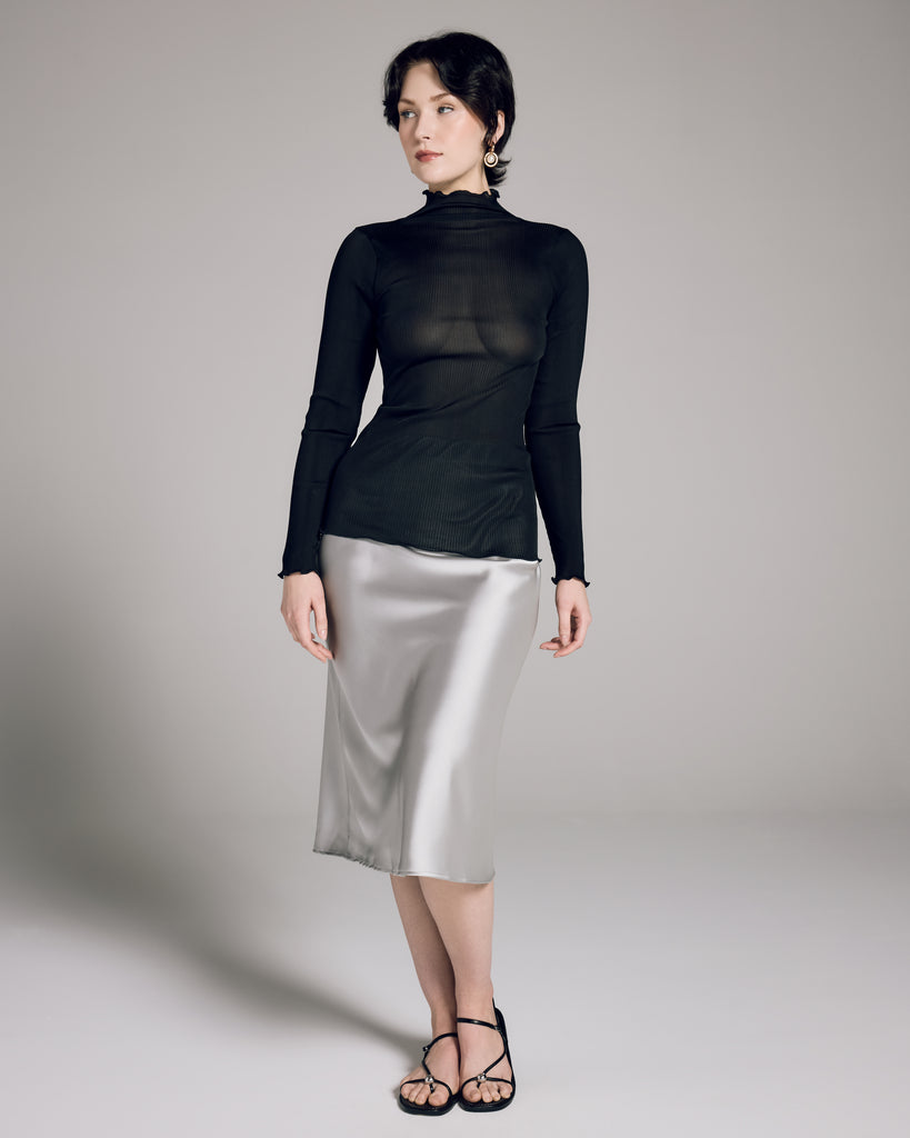 Lightweight rib silk top from Aromatique will stretch to hug every curve, hitting at the hip on most