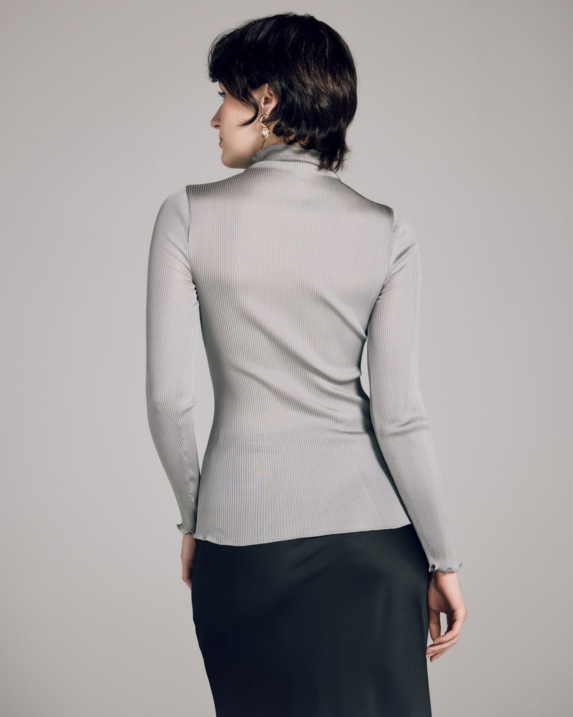 Lightweight silver rib silk top from Aromatique will stretch to hug every curve, hitting at the hip on most
