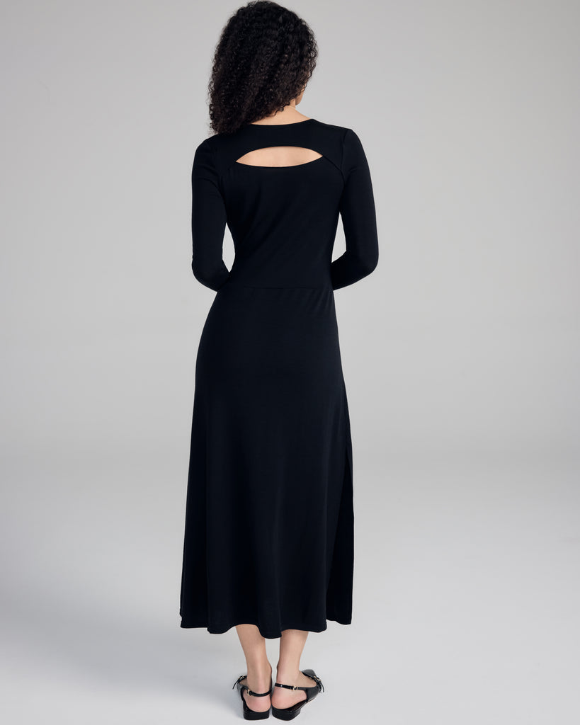 Aromatique's wool sweater dress has long sleeves, with a fitted torso and a cutout that can be worn either to the front or back