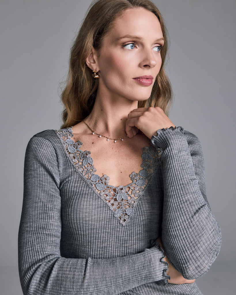 Stretchy grey Fiamma wool-silk long sleeved top from Boglietti has a plunging vee neckline accented with floral macrame lace