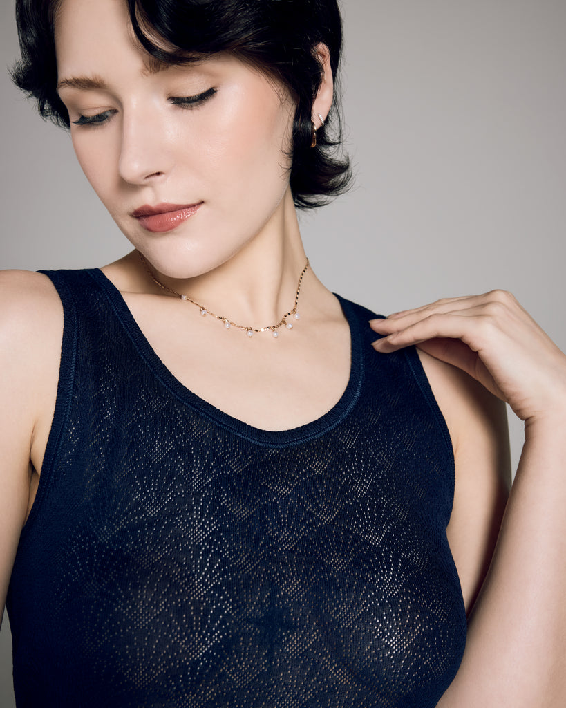 Rich blue Guenda camisole from Boglietti is crafted from a lightweight Filoscozia cotton with a starburst pattern knit into its design