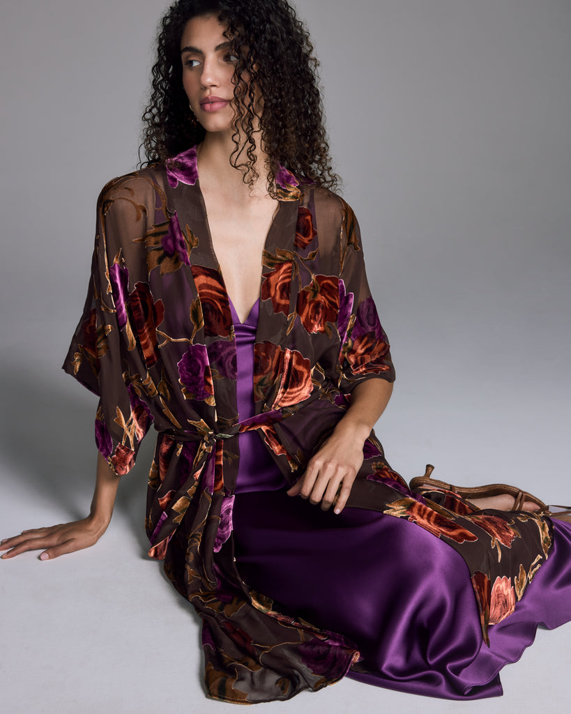 1920’s inspired Carmen jacket from Christine Vancouver is crafted from a sheer espresso brown silk chiffon with burnout rose devoré in shades of burnt orange, terracotta and plum 