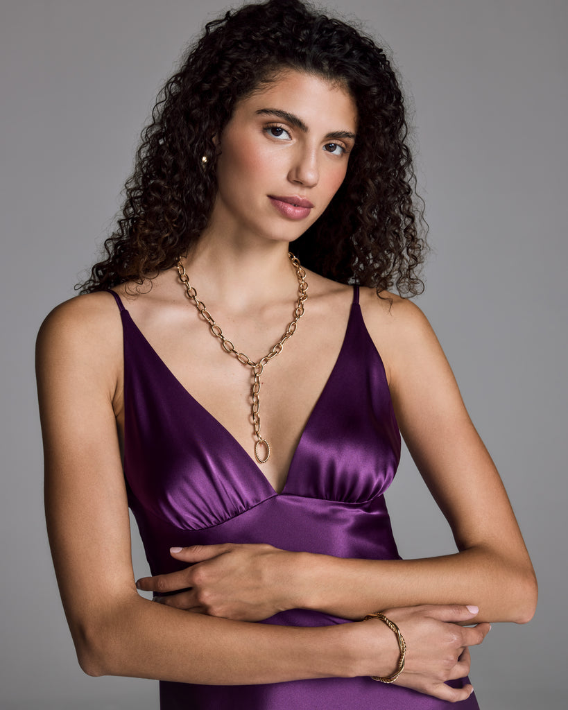 Christine Vancouver's Carmen gown has a plunging v neckline with gentle pleating at the base of the cups and adjustable spaghetti straps for fit