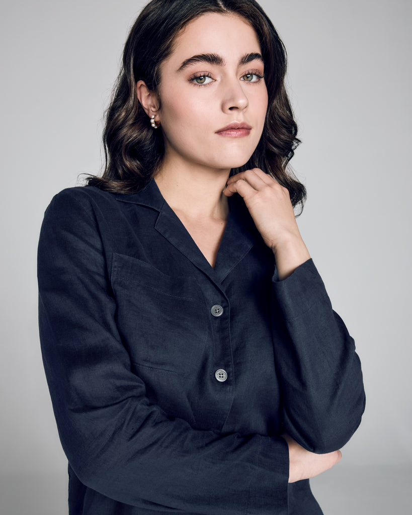 The Sicily pajama from Derek Rose has a button-down top with a relaxed fit, long sleeves, a notched collar, and mother of pearl buttons