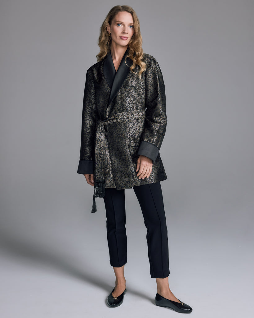 Classic Verona smoking jacket from Derek Rose is crafted from a luminous Italian silk jacquard with a black backdrop and roses in shimmering silver and gold