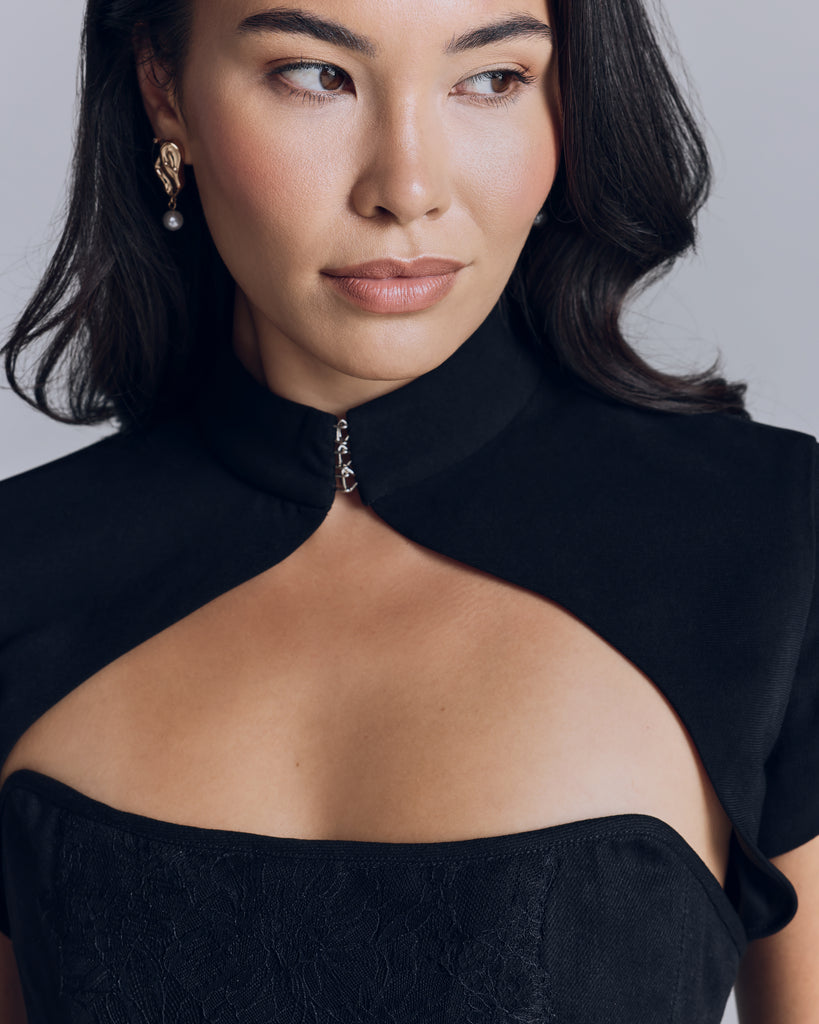 Tailored bolero jacket from Estelle Wiele is crafted from a breathable black Shanghai poly crepe