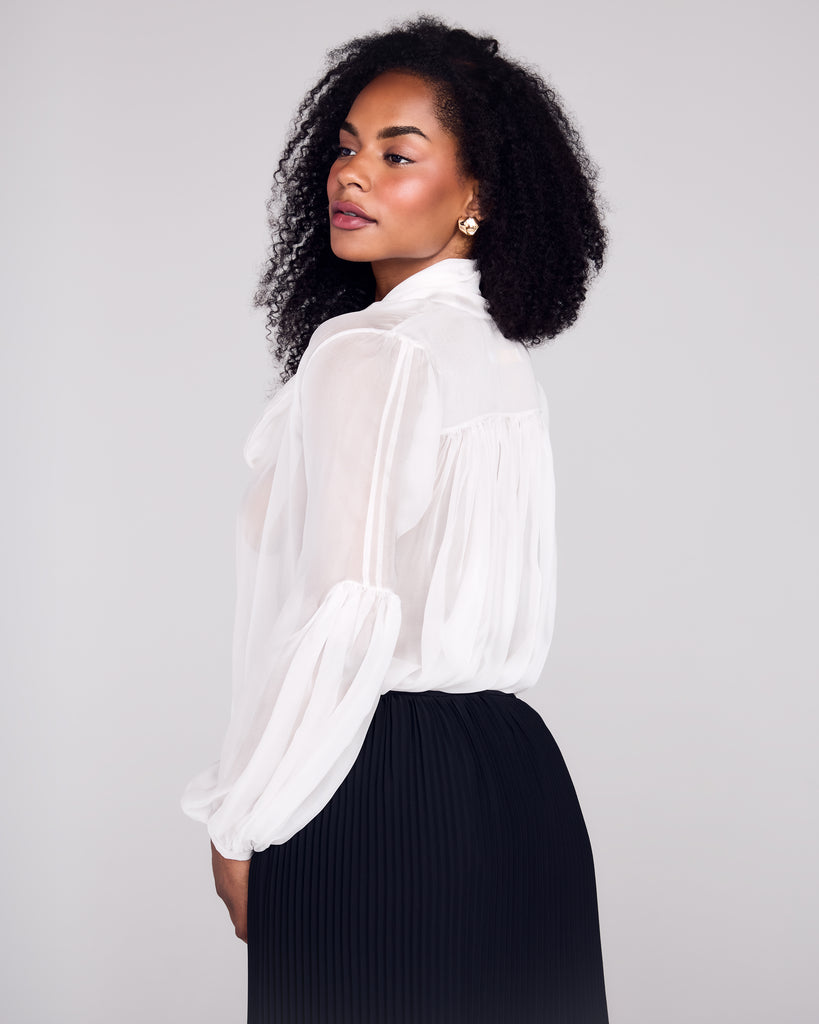 Beautifully crafted Brigitte silk blouse from FrancesKa is crafted from a whisper-weight transparent white silk chiffon