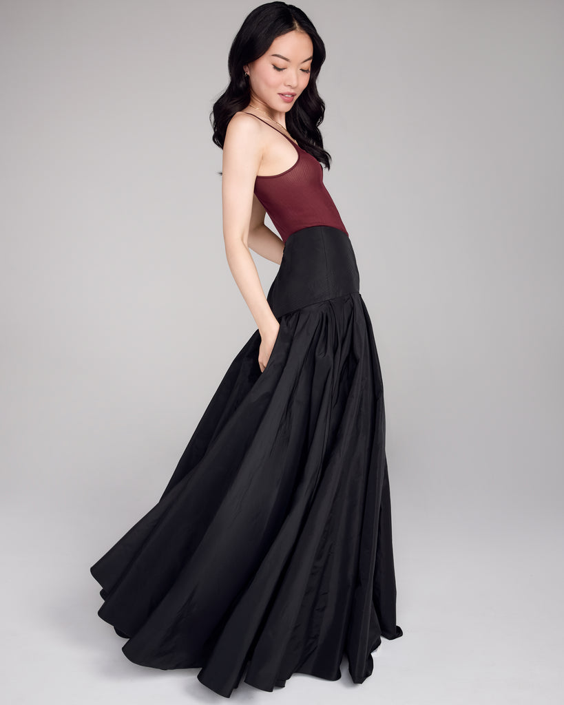 Glamorous Sussy floor-length black skirt from FrancesKa has an intricately stitched fitted waistband and a dramatically full pleated skirt