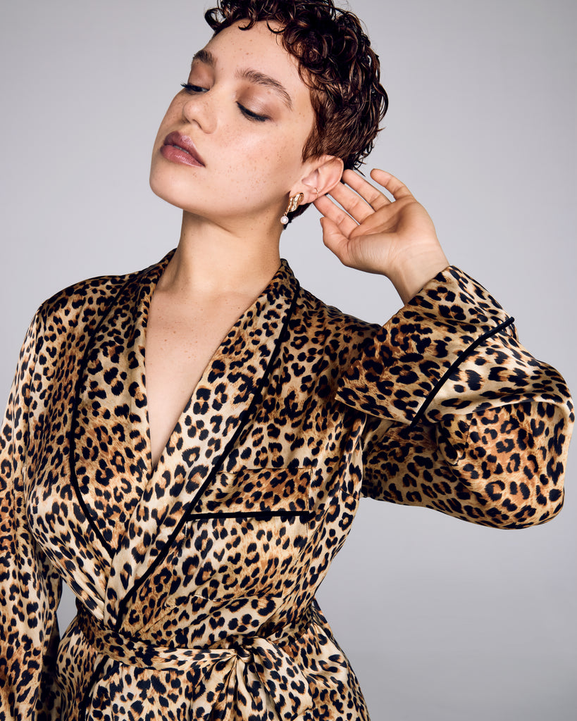 Gilda & Pearl's Golden Hollywood wrap top has decadent 1940’s styling, with black velvet piping, a shawl collar and patch pocket