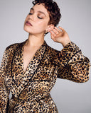 Gilda & Pearl's Golden Hollywood wrap top has decadent 1940’s styling, with black velvet piping, a shawl collar and patch pocket