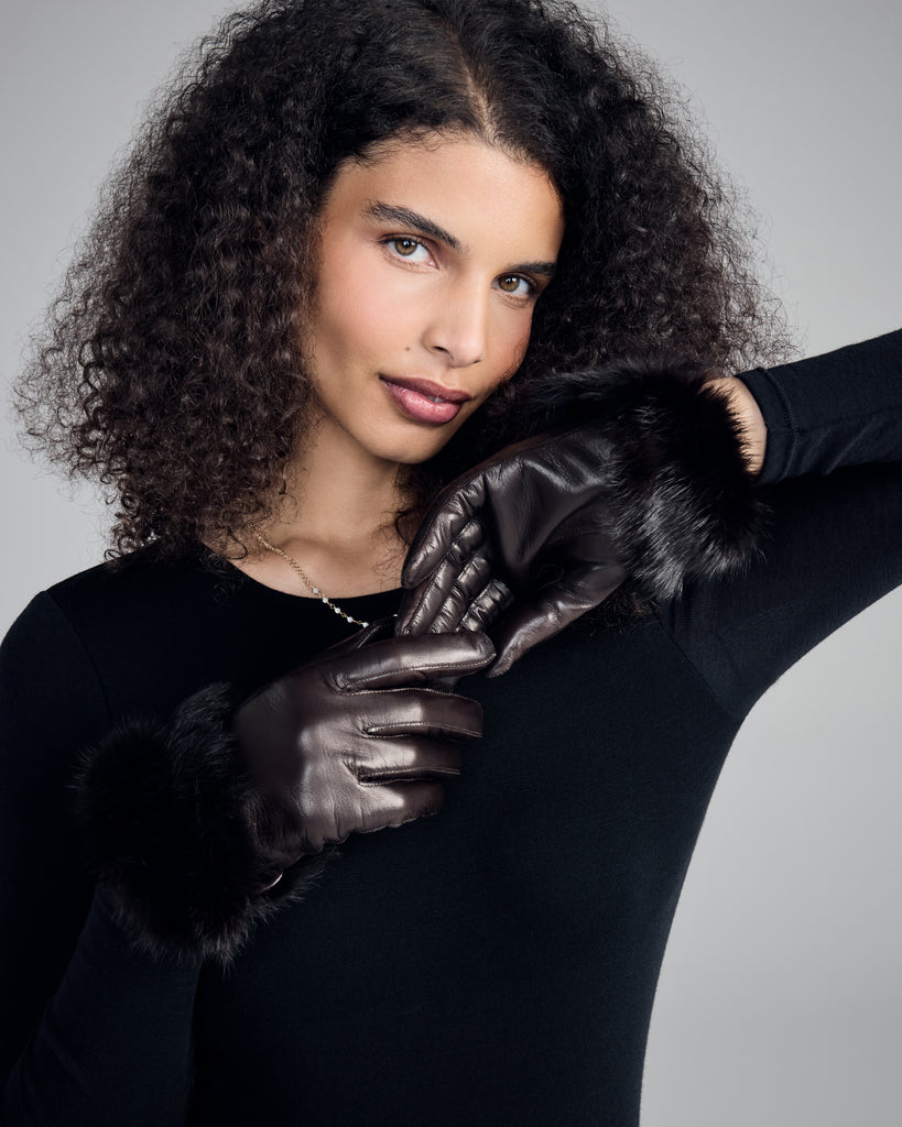 The Corina Brown Gloves from Karma hit around mid forearm with the fur lining worn down, near the wrist with the fur lining reversed