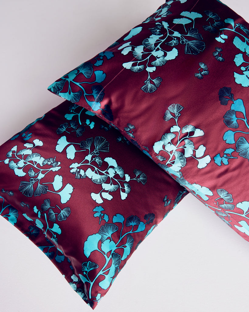 Pair of two (2) king-size envelope pillowcases are presented in their own matching silk pouch