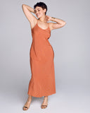 The Edo Yume Yellow silk slip dress from Karma on the Rocks hits around the ankle on most, with a scoop neckline and lower scooped back