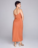 The Eco Yume Yellow silk crepe slip dress from Karma on the Rocks is crafted from a psychedelic geometric print in shades of yellow, orange and purple