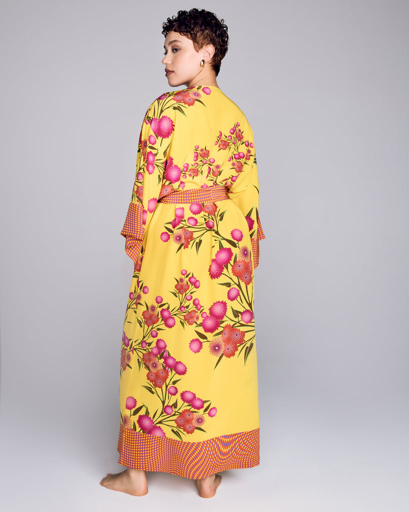 The one-size cut on Karma's Kobe Yuri Yellow Silk Robe is loose and easy, with 3/4 sleeves and an ankle length