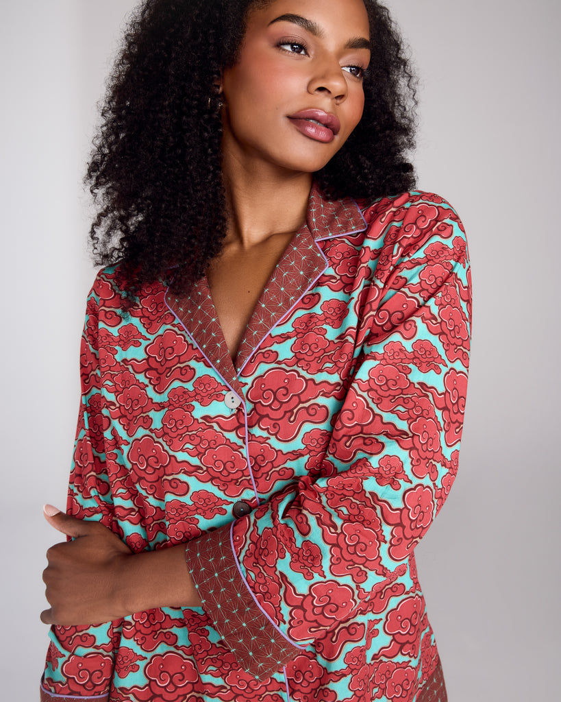 Exquisite Isa Kumo cotton pajama from Karma on the Rocks is crafted from a high-quality teal cotton with a Japanese-inspired red cloud print and a contrast burgundy and teal geometric print
