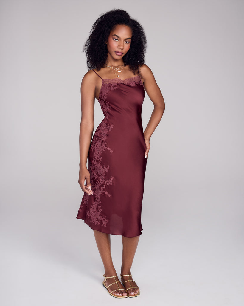 Merle Noir's Carmine silk slip dress is crafted from a rich burgundy red silk with lavish color-matched lace appliqué