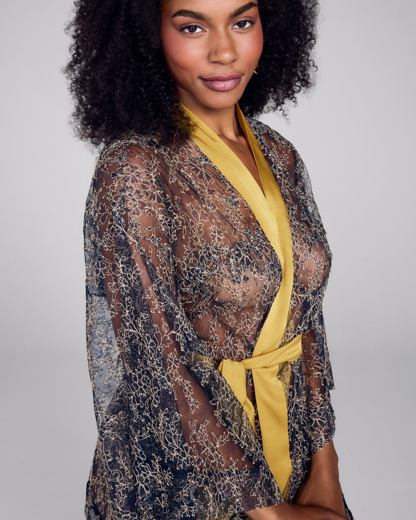 Seams through the body on this robe from Merle Noir have been painstakingly stitched into the design of the lace itself, leaving the only visible seams at the cuffs and hem for weight and fit