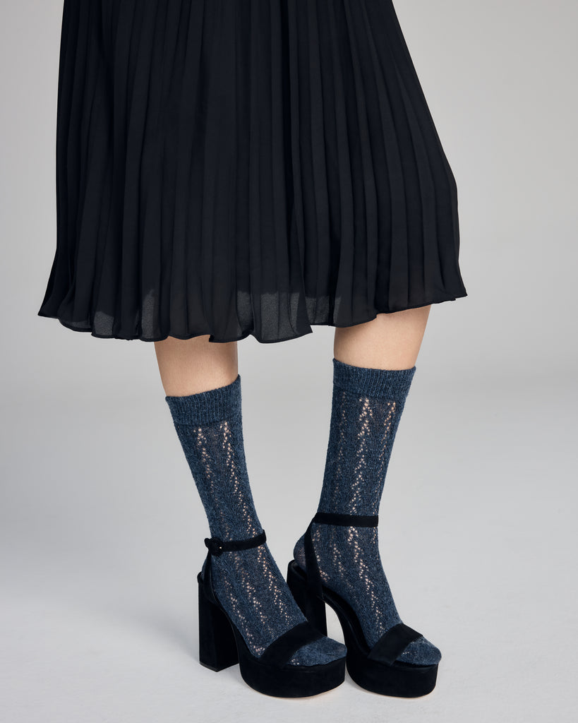 Denim Carolyn knee high from Pierre Mantoux is cozy and fashionable