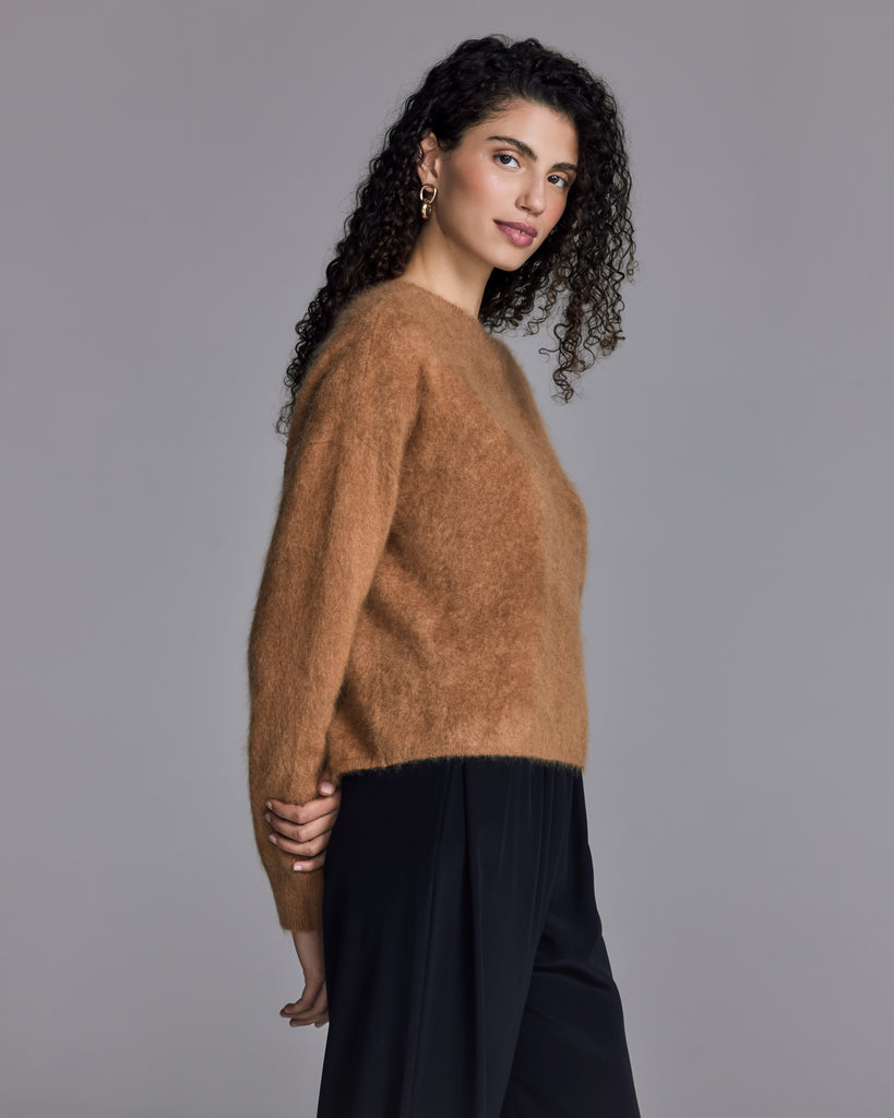 The Sensual Dive sweater from Raev Paris is crafted from a sumptuous brushed camel Mongolian cashmere