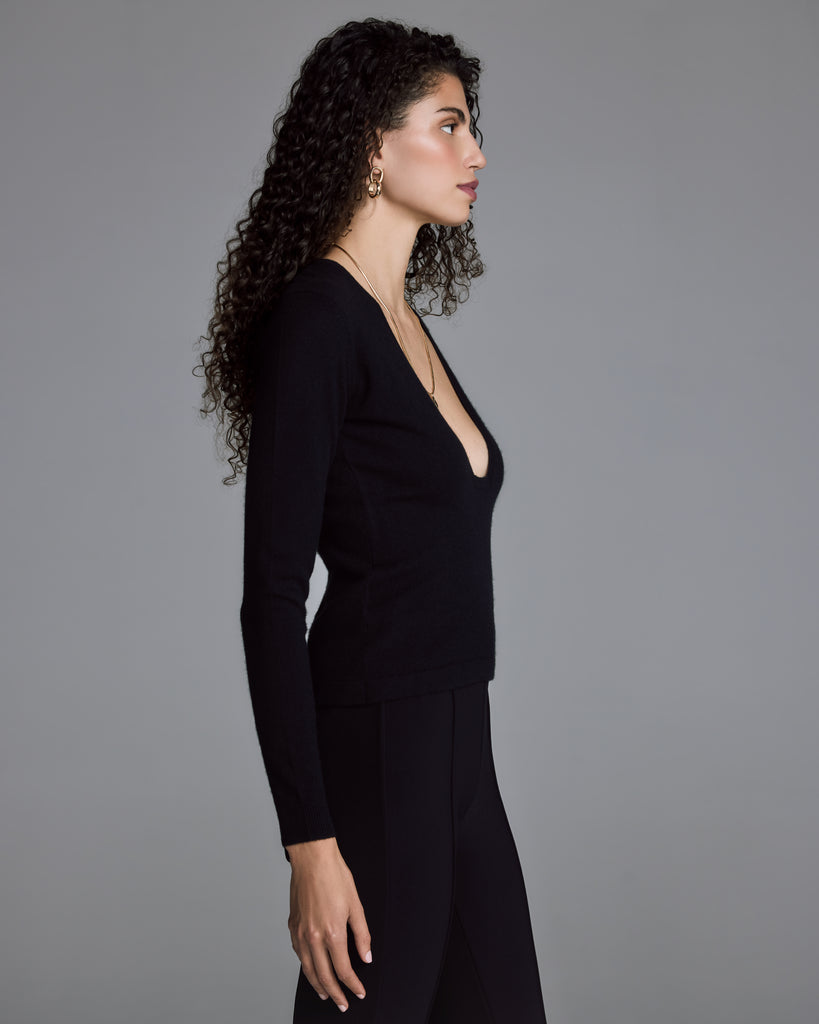 Raev's Sculpted Temptation sweater has a slim fit with long sleeves and a ribbed hem