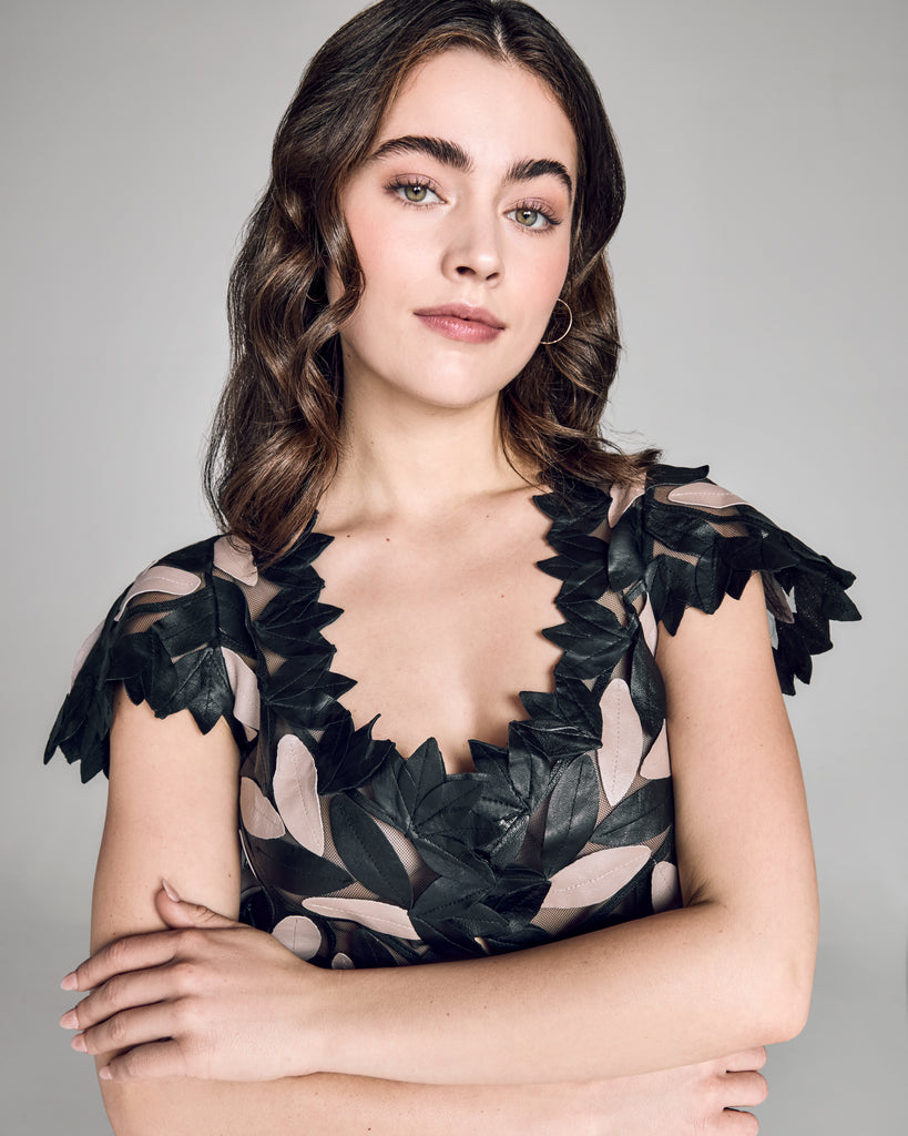 Zambak's flat leaf shrug top showcases soft black and taupe leather leaves and geometric stripes individually stitched to sheer black tulle