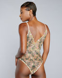 Gilda & Pearl's Fiori bodysuit has an elasticized waist for an easy fit, silk binding and adjustable silk straps with 24k gold plated adjusters