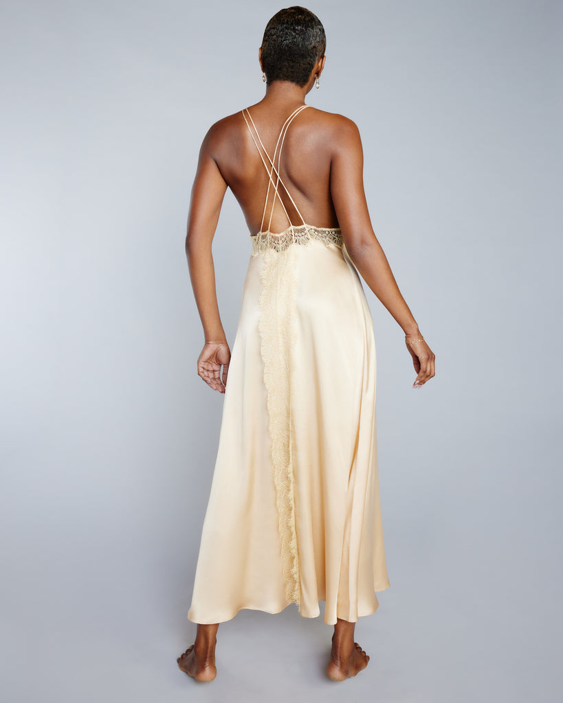 Layalina's Alexandria gown has sheer lace inset at the under bust, with an extra panel of lace going all the way down the center back of the skirt