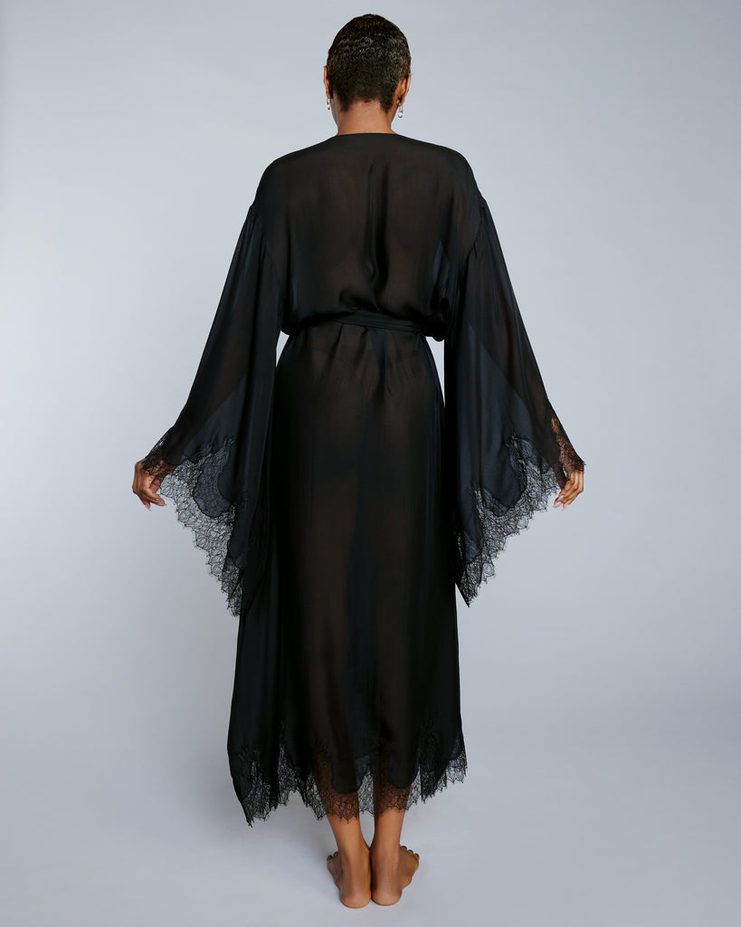 The Assiyah robe from Layalina is designed to drape on the body, with a sheer silk body and lace appliqué at the wrists and hem