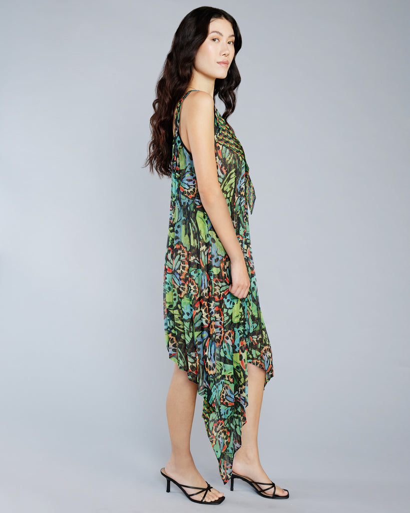 A-line dress from Zoelle is crafted from a lightweight chiffon with intricate prints in shades of green, blue, orange, black and red