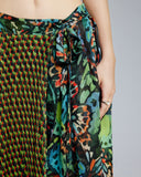 Contrasting prints and textures add visual interest to the Malachite Butterfly skirt from Zoelle: the majority of the skirt showcases a loosely-pleated butterfly inspired print, with a panel of a tightly pleated geometric print at the front