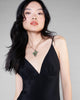 Christine Vancouver's Meghan Luxe Silk Crepe Gown has a plunging V neckline with gentle pleating at the base of the cups and adjustable spaghetti straps for fit