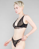 Matching Phelea Brazilian brief from Hérve by Céline Marie has gilded lace appliqué at the front with delicate lace trim on the sides and an entirely sheer lace rear