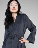 Long-sleeved and full length, the Morpho + Luna robe closes with a wrap-around external tie