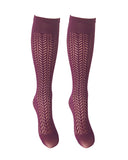 Openwork microfiber Valeria knee-highs from Trasparenze showcase a graphic herringbone pattern in rich magenta purple
