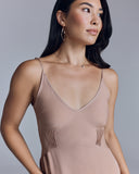 Easy and comfortable, the Cadel Bare slip from Araks has a vee neckline, draped fit through the body, side darts and pin tucking details under the bust