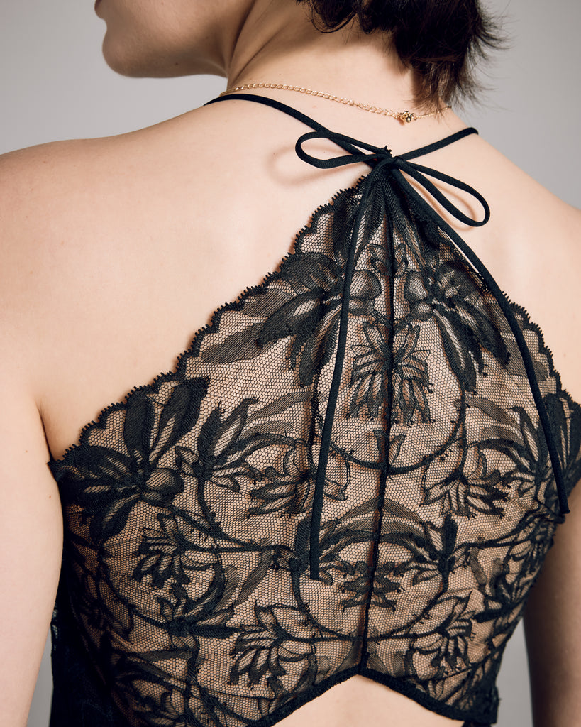 V-neck camisole from Aromatique is entirely sleek filoscozia cotton at the front, with a sheer lace back and adjustable halter neckline with a bow tie closure