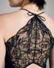 V-neck camisole from Aromatique is entirely sleek filoscozia cotton at the front, with a sheer lace back and adjustable halter neckline with a bow tie closure