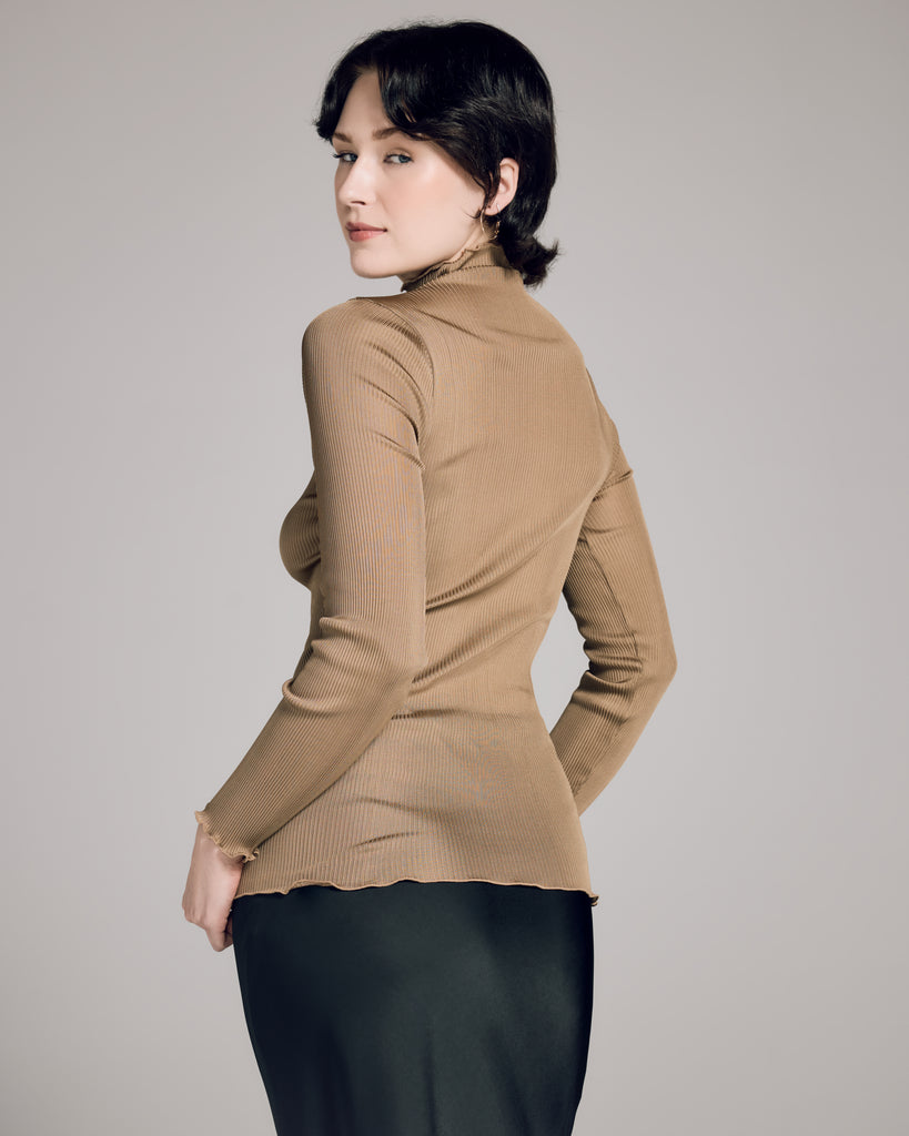 Lightweight gold rib silk top from Aromatique will stretch to hug every curve, hitting at the hip on most