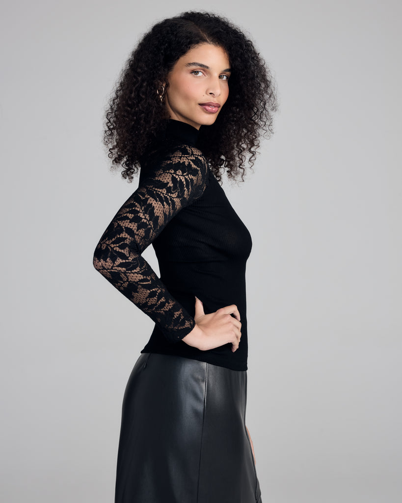 This Aromatique top has Sophie Halette lace sleeves that are soft and dramatic, showcasing bold foliage