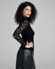 This Aromatique top has Sophie Halette lace sleeves that are soft and dramatic, showcasing bold foliage