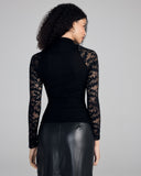 Ribbed cotton stretches to fit the body on this top from Aromatique, with a halter neckline, mock turtleneck and upper hip length 