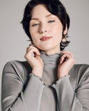 Luxe silver long-sleeved, mock-neck top  from Aromatique is crafted from a ribbed 100% silk