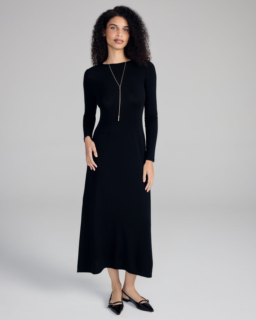 Cozy dress from Aromatique is crafted from an ultra fine black knit wool