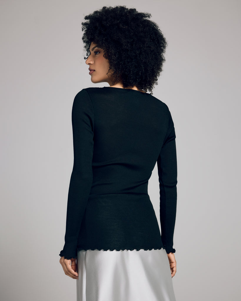 The lightweight rib of Boglietti's Bridget top will stretch to hug every curve, hitting at the hip on most