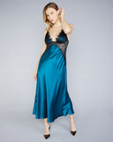 The Erte gown from Christine Vancouver has a v neckline, adjustable silk spaghetti straps