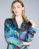 Christine Vancouver's Erte button-down top has a relaxed silhouette, curved notch lapels, and black silk piping