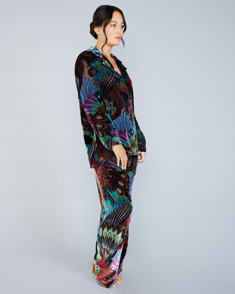 Christine Vancouver's Erte pajamas have a button-down top with a relaxed silhouette, curved notch lapels, and black silk piping