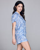 The button down top on the Derek Rose Milan shortie pajama has a relaxed fit with short sleeves, a notched collar, and mother of pearl buttons